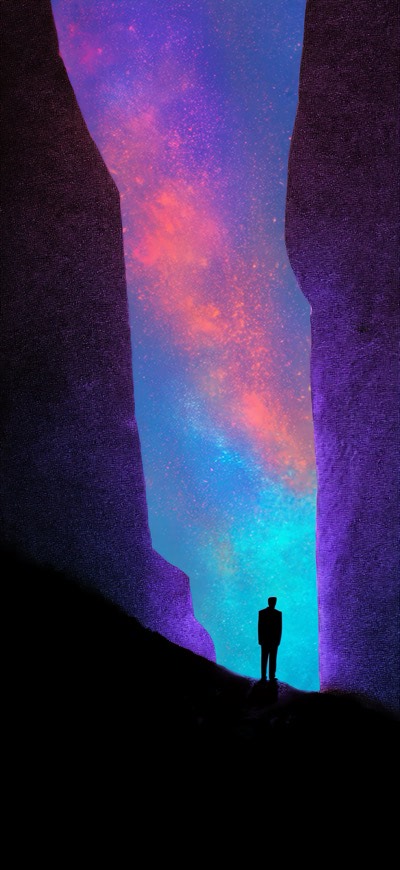 Standing Against Colorful Night Sky
